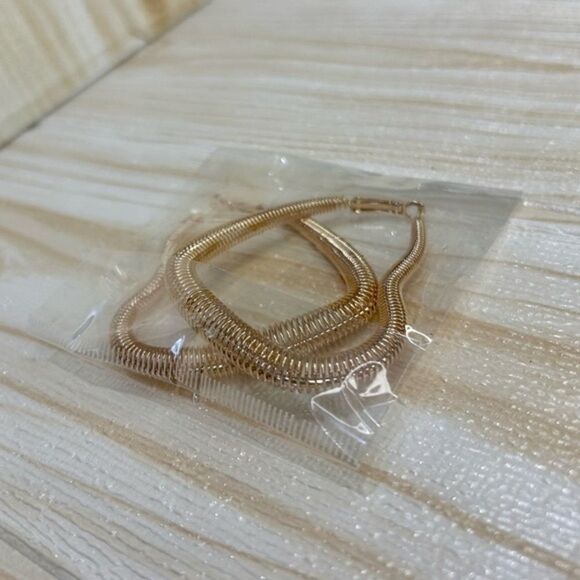 Large Gold-Tone Heart Shaped Hoop Earrings - Picture 2 of 4